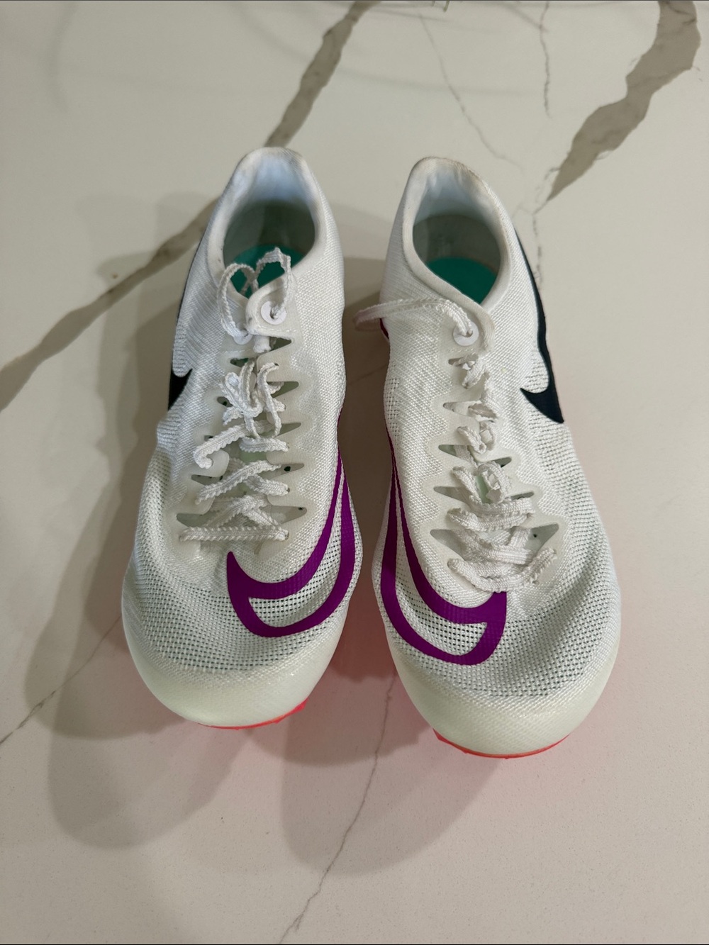 Nike Women’s White Running Shoes with Purple and Black Swooshes